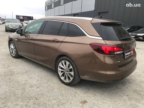 Opel Astra 2016 коричневый - фото 5
