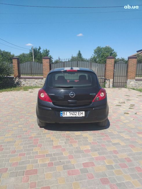 Opel Corsa 2011 черный - фото 8