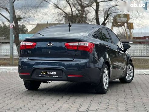 Kia Rio 2013 - фото 14