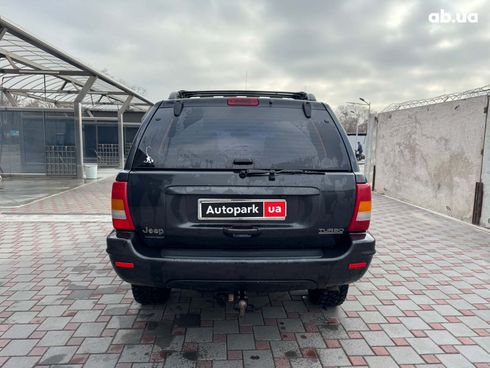 Jeep Grand Cherokee 2001 черный - фото 4