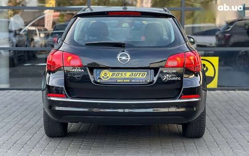 Opel Astra 2013 - фото 6