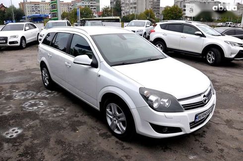 Opel Astra 2010 - фото 13