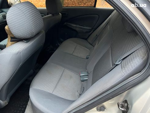 Nissan Almera 2006 бежевый - фото 38