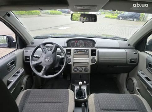 Nissan Navara 2006 черный - фото 7