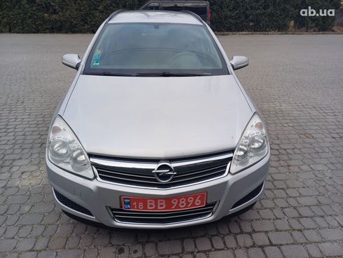Opel Astra 2009 серый - фото 2