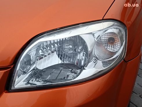 Chevrolet Aveo 2008 оранжевый - фото 10
