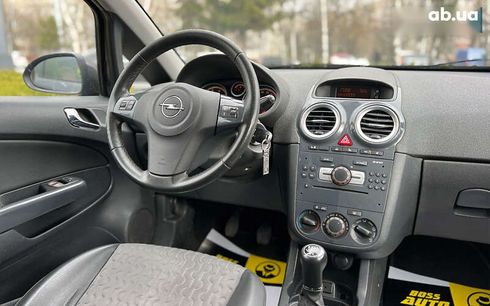 Opel Corsa 2011 - фото 13