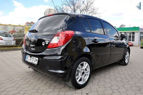 Opel Corsa 2008 - фото 7