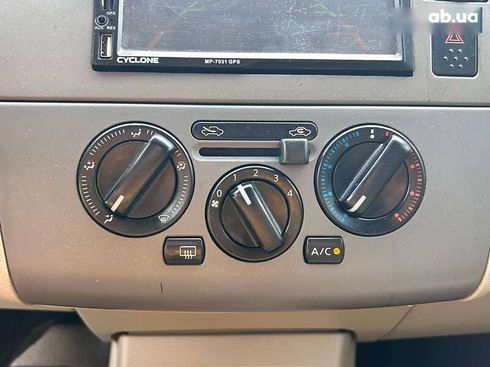 Nissan Tiida 2006 - фото 22