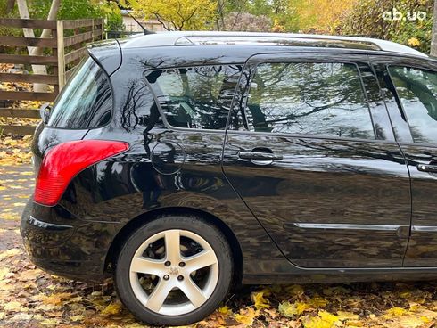 Peugeot 308 2011 черный - фото 13