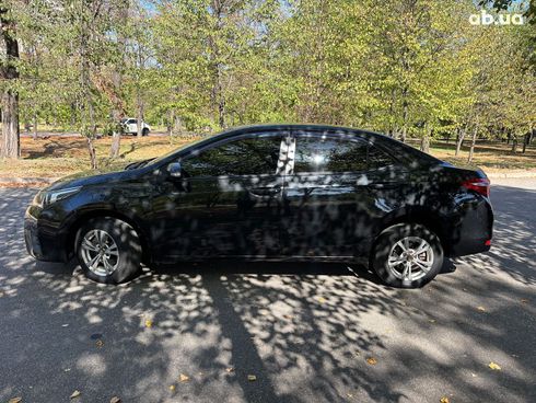 Toyota Corolla 2016 черный - фото 2