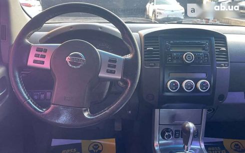 Nissan Navara 2011 - фото 12