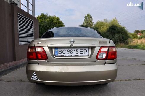 Nissan Almera 2004 - фото 12
