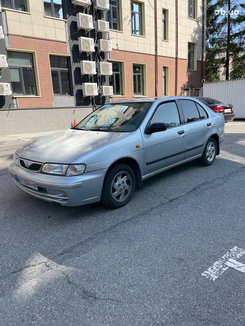 Nissan Almera 1998 серебристый - фото 10