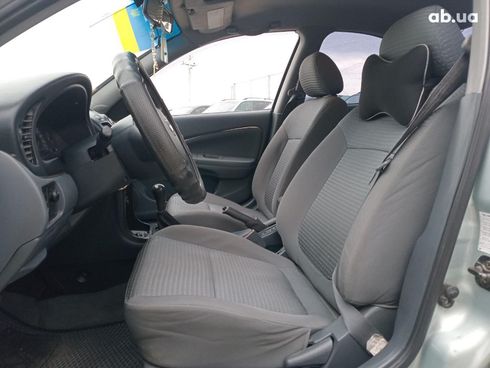 Nissan Almera 2007 серый - фото 21