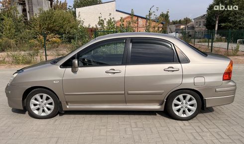 Suzuki Liana 2007 золотистый - фото 6