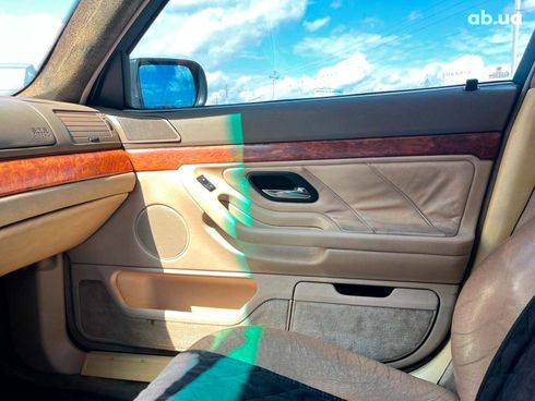 BMW 7 серия 1994 красный - фото 26