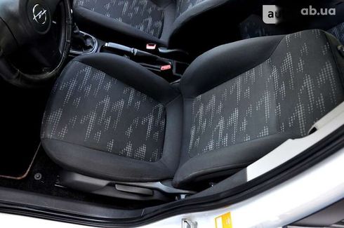 Opel Corsa 2012 - фото 26