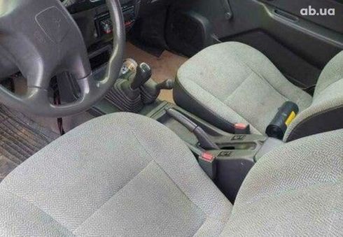 Mitsubishi L200 2007 зеленый - фото 3