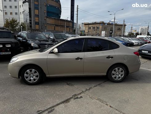 Hyundai Elantra 2010 бежевый - фото 2