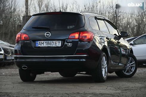 Opel Astra 2014 - фото 12
