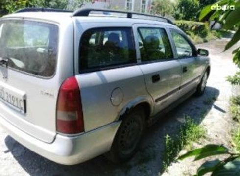 Opel Astra G 1999 серебристый - фото 2