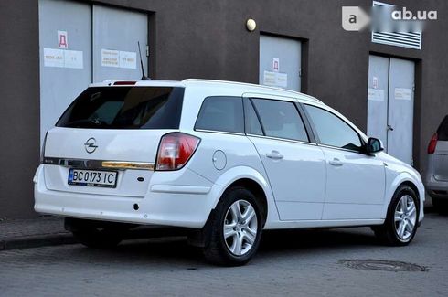 Opel Astra 2010 - фото 16