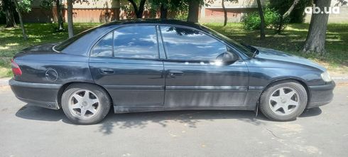 Opel Omega 1994 черный - фото 5