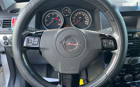Opel Astra 2010 - фото 12