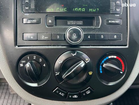 Chevrolet Lacetti 2006 черный - фото 27