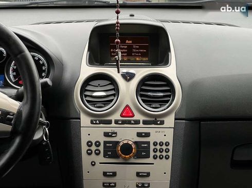 Opel Corsa 2008 - фото 14