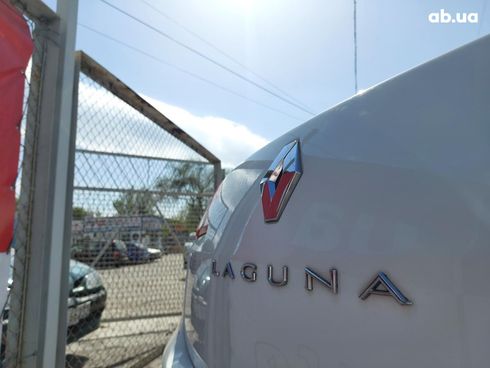 Renault Laguna 2013 белый - фото 12