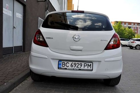 Opel Corsa 2012 - фото 7