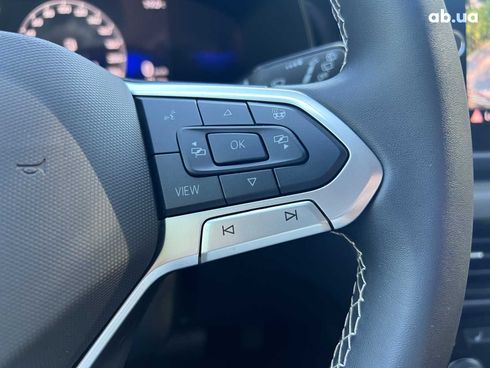 Volkswagen Taos 2023 синий - фото 19