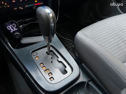 Nissan Almera 2006 бежевый - фото 25