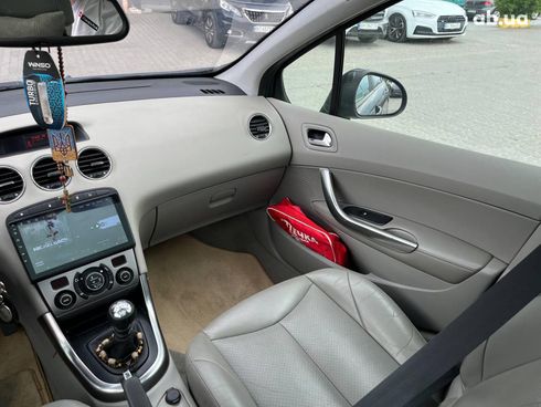 Peugeot 308 2010 синий - фото 31