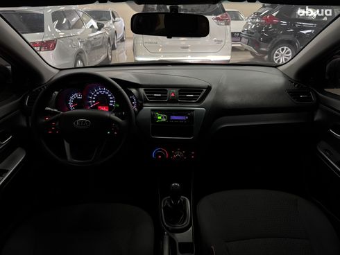 Kia Rio 2012 белый - фото 11