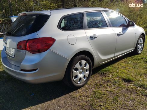 Opel Astra J 2011 серебристый - фото 15