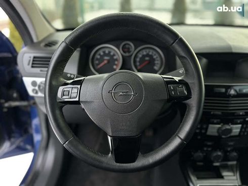 Opel Astra 2010 - фото 26