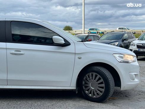 Citroёn C-Elysee 2013 белый - фото 11
