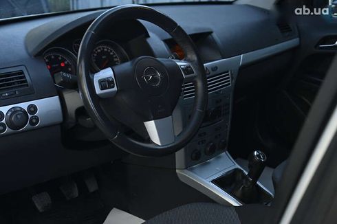 Opel Astra 2009 - фото 13