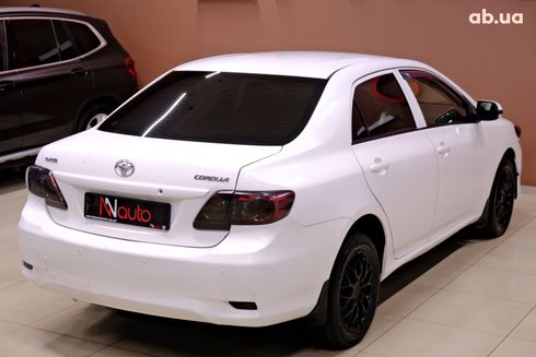 Toyota Corolla 2011 белый - фото 5