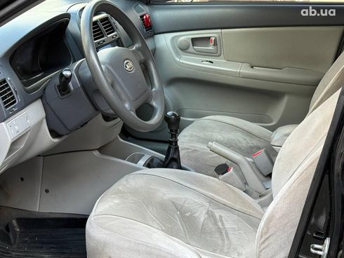 Kia Cerato 2008 черный - фото 21