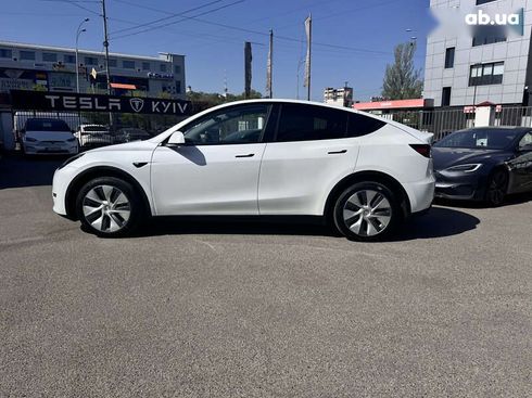 Tesla Model Y 2024 - фото 10