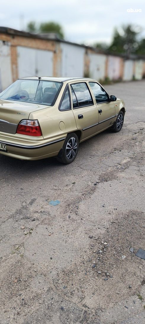 Daewoo Nexia 2008 золотистый - фото 11