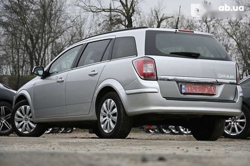 Opel Astra 2010 - фото 11