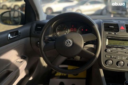 Volkswagen Golf 2004 - фото 11