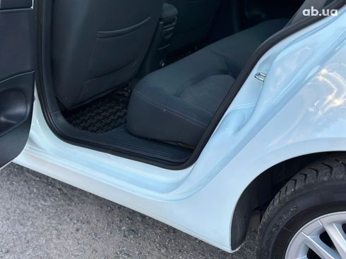 Renault Laguna 2007 белый - фото 25