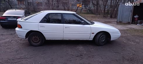 Mazda 323 1990 белый - фото 4