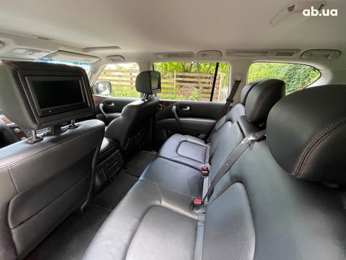 Nissan Patrol 2013 белый - фото 24